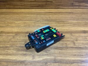 2012-2021 BMW X5 F15 4.4L Engine Fuse Relay Box w/ Bracket Rear Side OEM
