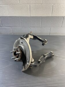 2017-2021 Jaguar F-Pace X761 Rear Left Spindle Knuckle Hub W/ Arms OEM