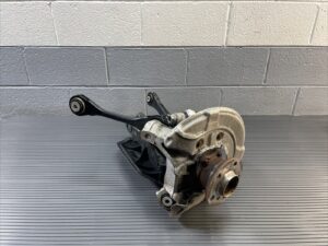 2019-2026 BMW X7 G07 Rear Left Spindle Knuckle Wheel Bearing Carrier OEM